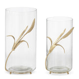 Two clear glass cylinder vases with sculptural gold wheat