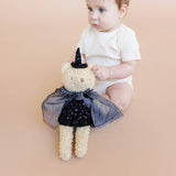 Child holding Witch Bear, Stone Hollow Farmstead