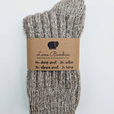 Rib knit crew socks in natural grey wool alpaca cotton hemp blend folded with label