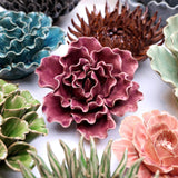 Purple Lettuce Ceramic Wall Flower styled with coordinating ceramic flowers at Stone Hollow Farmstead