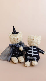 Witch Bear seated beside Skeleton Bear, Stone Hollow Farmstead