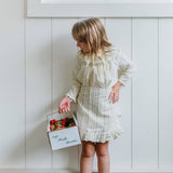 child half apron-stone hollow farmstead-flowerie  