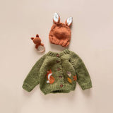Woodland Fox Cardigan styled with a fox hat and rattle, Stone Hollow Farmstead
