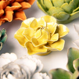 Buttercup Yellow Daffodil Ceramic Wall Flower styled with coordinating ceramic flowers at Stone Hollow Farmstead