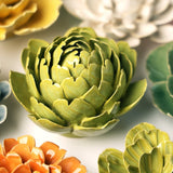 Chartreuse Queen Protea Ceramic Wall Flower styled with coordinating ceramic flowers at Stone Hollow Farmstead