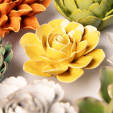 Burnt Yellow Begonia Ceramic Wall Flower styled with coordinating ceramic flowers at Stone Hollow Farmstead