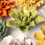 Chartreuse Tiger Lily Ceramic Wall Flower styled with coordinating ceramic flowers at Stone Hollow Farmstead