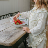 child half apron-stone hollow farmstead-flowerie  